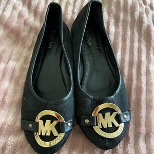 black and gold Michael Kors flats